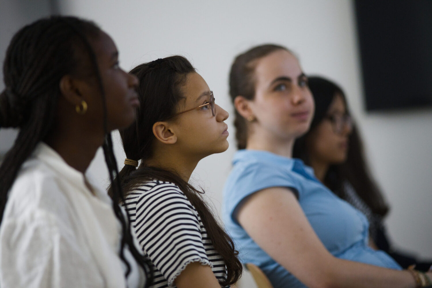 Portrait d'une étudiante assistant à une conférence pendant un événement professionnel